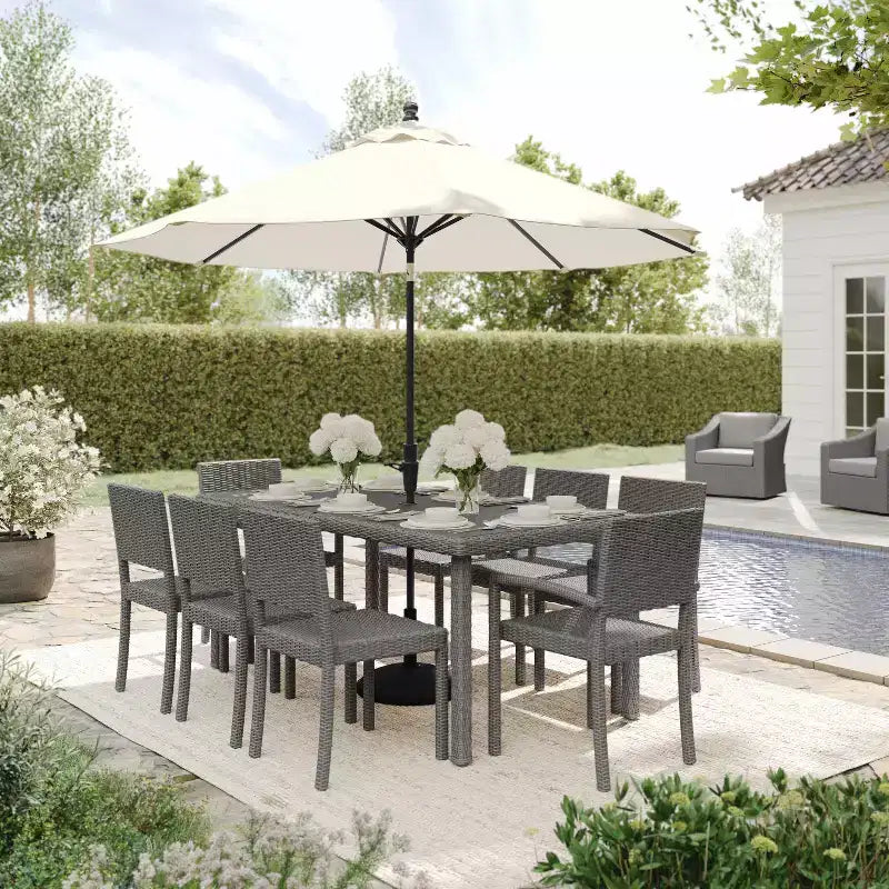 Martha Stewart Bedford 9-Piece Indoor-Outdoor Dining Set with 8 Stackable Dining Chairs and 71 Patio Table with Engineered Wood Top in Rattan Wicker