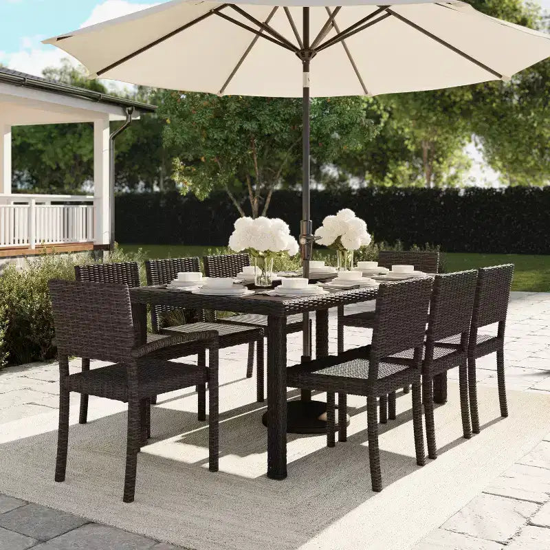 Martha Stewart Bedford 9-Piece Indoor-Outdoor Dining Set with 8 Stackable Dining Chairs and 71 Patio Table with Engineered Wood Top in Rattan Wicker