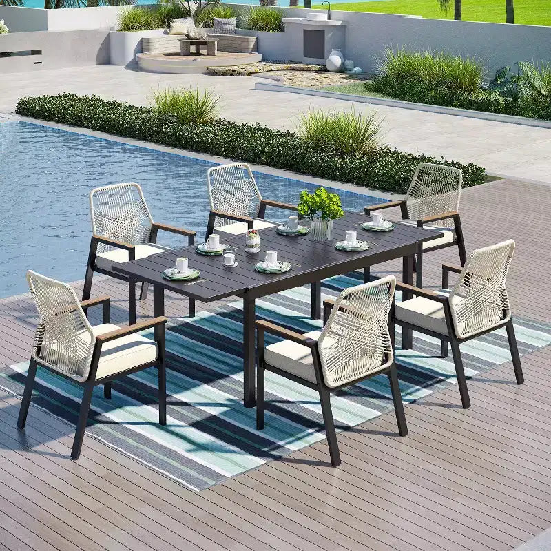 Captiva Designs tavolo da pranzo espandibile in acciaio 7 pezzi e sedie girevoli in vimini con cuscini spessi