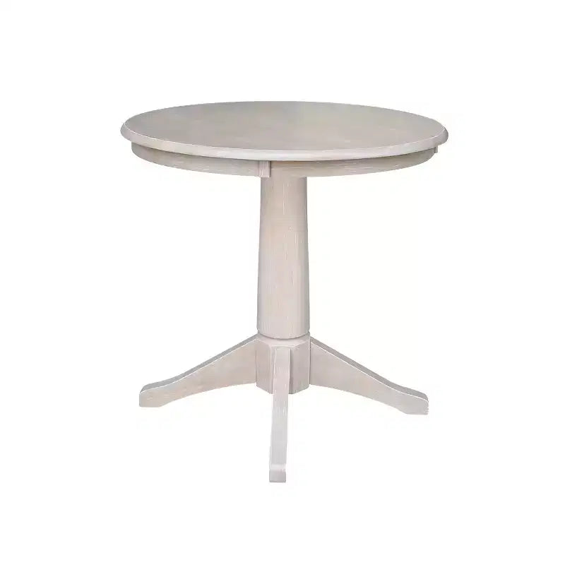 Tavolo con piedistallo Stacy piano rotondo noce americano marrone - International Concepts