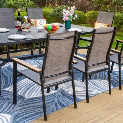 Set da pranzo da giardino MAISON ARTS da 9 pezzi con 8 sedie impilabili in textilene e 1 tavolo in metallo