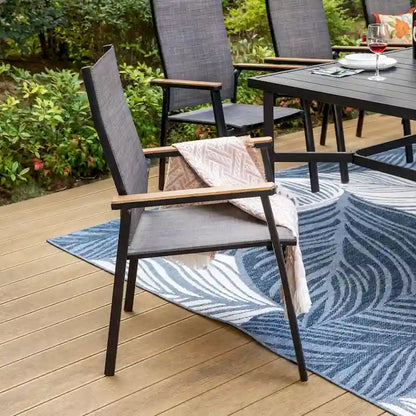 Set da pranzo da giardino MAISON ARTS da 9 pezzi con 8 sedie impilabili in textilene e 1 tavolo in metallo